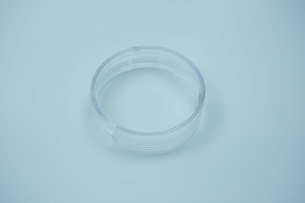 Mirror-finish transparent screw cap